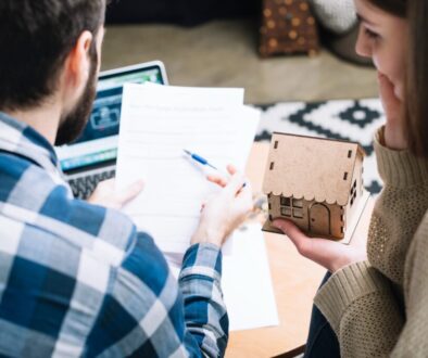 A couple learning how much does it cost to sell a house